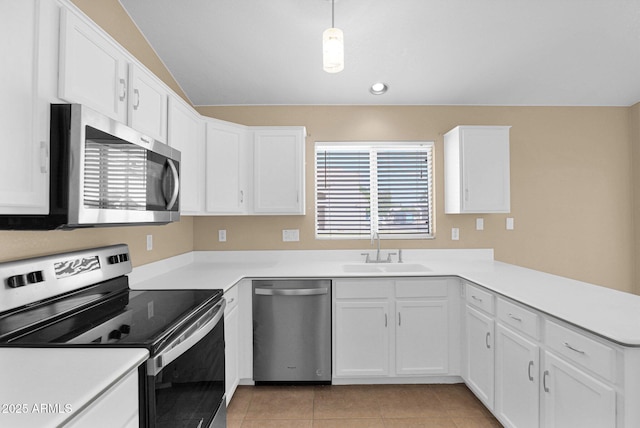 5252 W Pontiac Dr, Glendale, AZ 85308 - kitchen with a sink, white cabinets, appliances with stainless steel finishes, and a peninsula