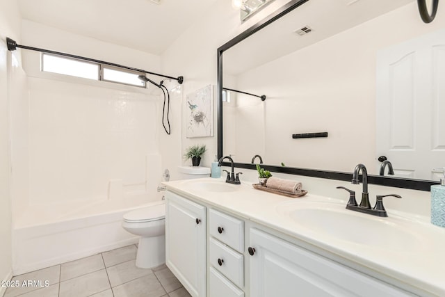 full bathroom with vanity, toilet, tile patterned floors, and  shower combination