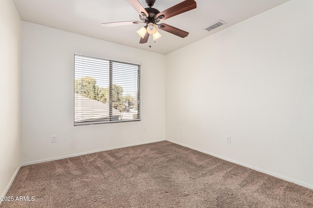 carpeted empty room with ceiling fan