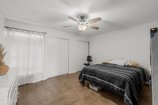 6008 W Augusta Ave, Glendale, AZ 85301 - bedroom featuring multiple closets and a ceiling fan