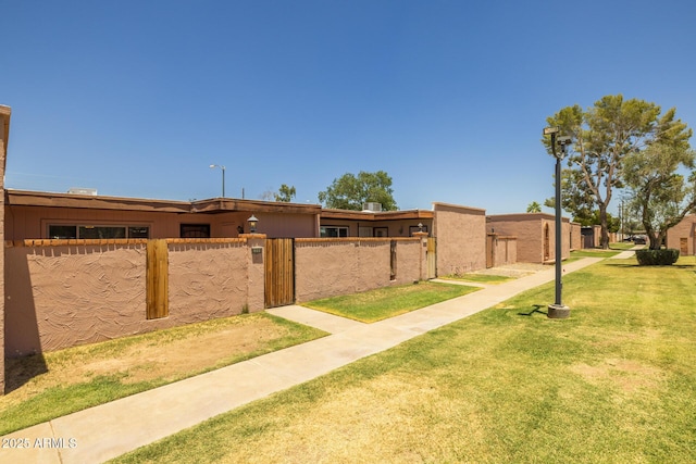 6008 W Augusta Ave, Glendale, AZ 85301 - fenced front yard featuring a gate