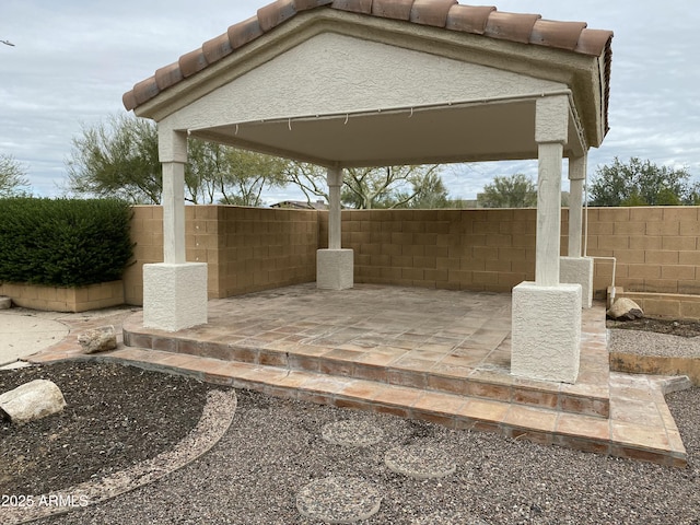 view of patio with fence