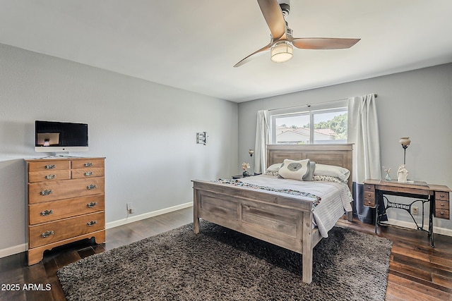 402 E Claremont St, Phoenix, AZ 85012 - bedroom featuring wood finished floors, baseboards, and a ceiling fan