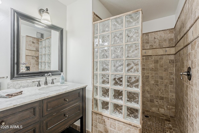 402 E Claremont St, Phoenix, AZ 85012 - bathroom with walk in shower and vanity