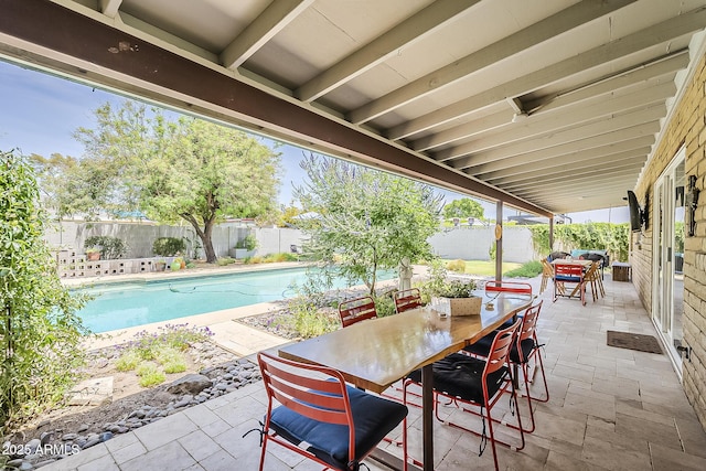 402 E Claremont St, Phoenix, AZ 85012 - fenced backyard with outdoor dining area and a patio