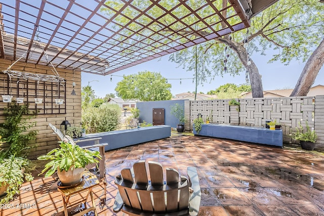 402 E Claremont St, Phoenix, AZ 85012 - fenced backyard featuring a patio area and a pergola