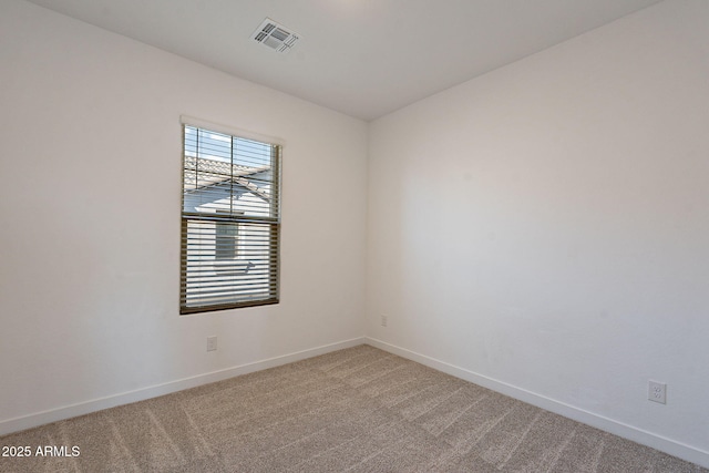 9835 E Wavelength Ave, Mesa, AZ 85212 - spare room with visible vents, light colored carpet, and baseboards