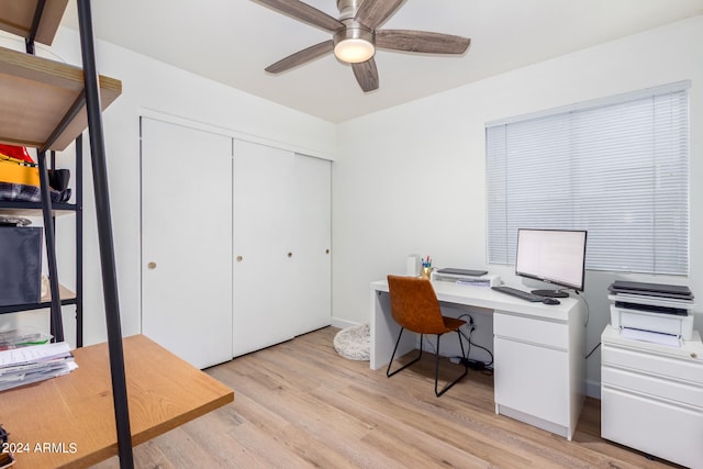 office featuring light wood-type flooring and ceiling fan