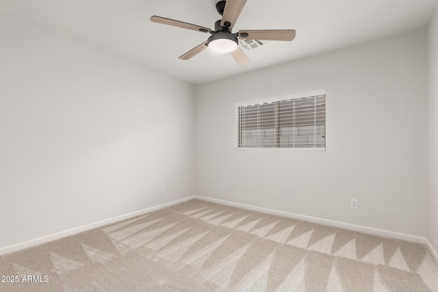 carpeted empty room with ceiling fan