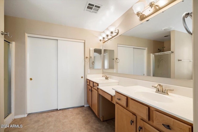 bathroom with vanity and walk in shower