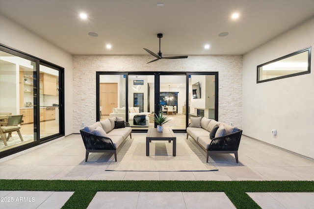 view of patio / terrace featuring ceiling fan and an outdoor hangout area