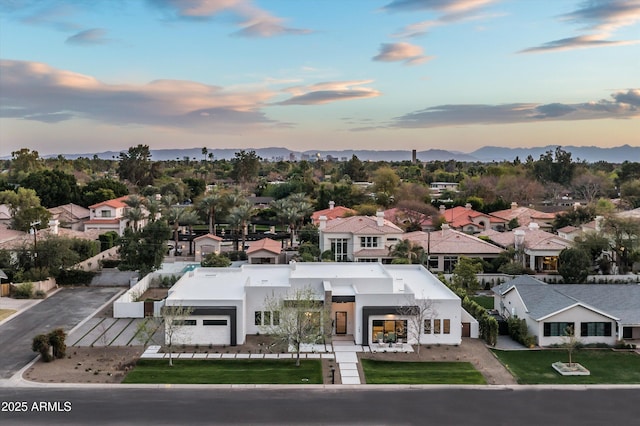 bird's eye view featuring a residential view and a mountain view