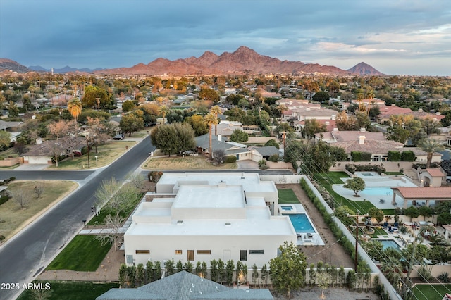 drone / aerial view with a residential view and a mountain view