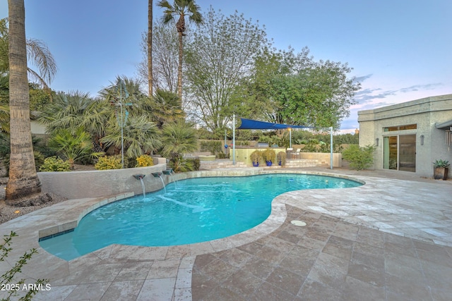 view of pool featuring a patio area