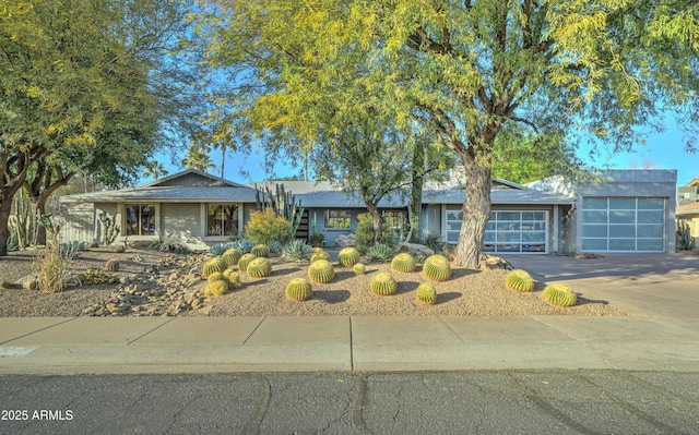 single story home featuring a garage