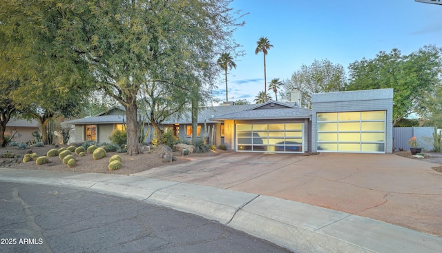 view of front of property featuring a garage