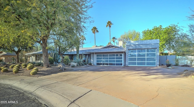 single story home with a garage