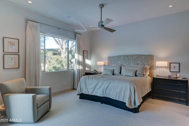 carpeted bedroom featuring ceiling fan