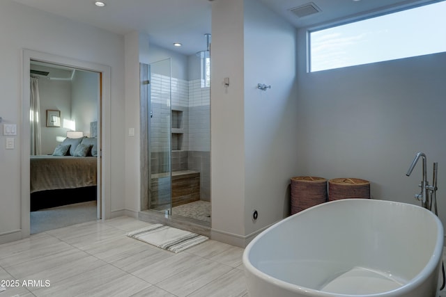 bathroom featuring shower with separate bathtub