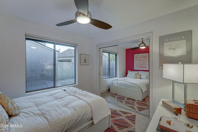 bedroom featuring a closet and ceiling fan