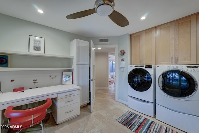 washroom with cabinets, ceiling fan, and washer and clothes dryer