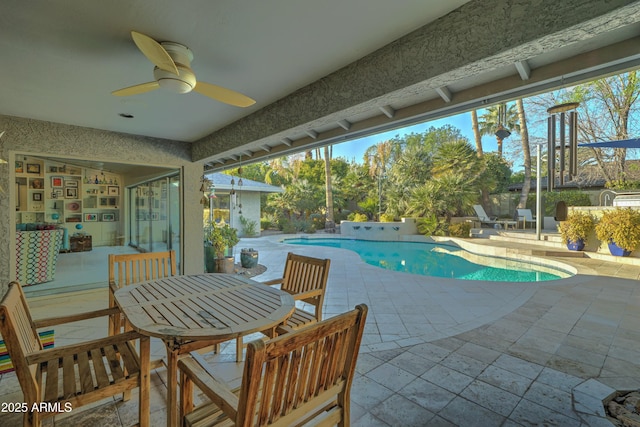 view of pool featuring a patio area and ceiling fan