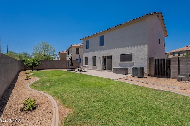 3047 S Mandy St, Mesa, AZ 85212 - back of house featuring stucco siding, a tiled roof, a fenced backyard, and a patio