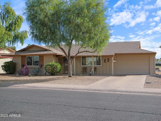 ranch-style home featuring a garage