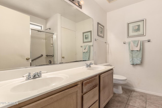 bathroom with a shower with shower door, tile patterned flooring, toilet, baseboards, and double vanity