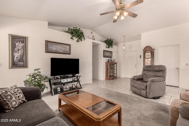carpeted living room with a ceiling fan, vaulted ceiling, and tile patterned floors