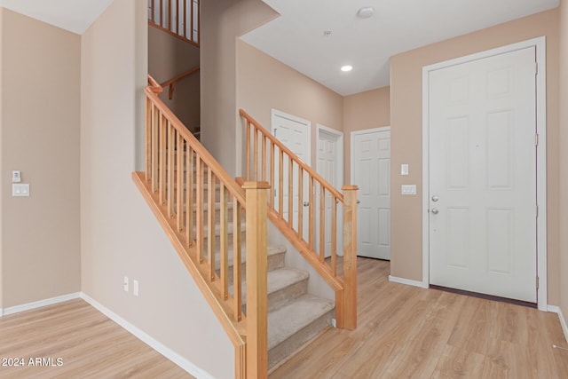 foyer with light hardwood / wood-style flooring