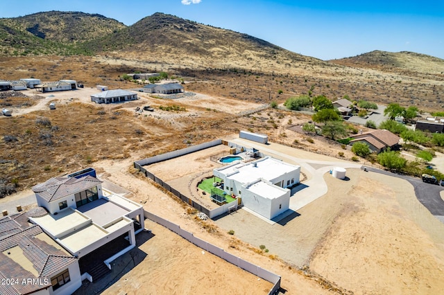 drone / aerial view featuring a mountain view