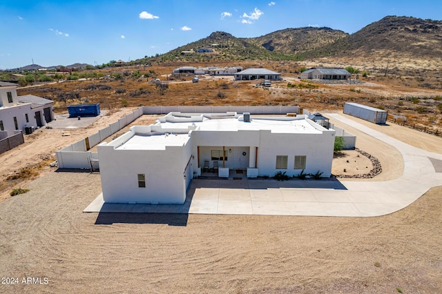 drone / aerial view featuring a mountain view