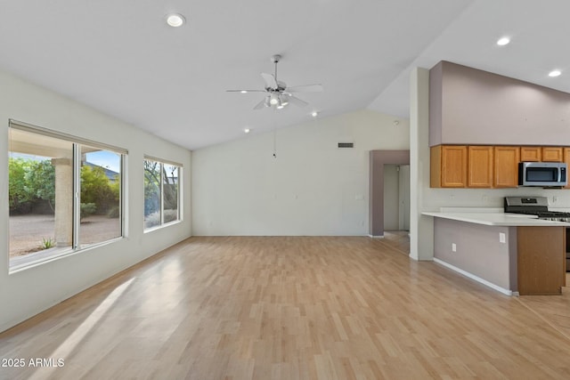 unfurnished living room with light wood-type flooring, visible vents, a ceiling fan, and recessed lighting