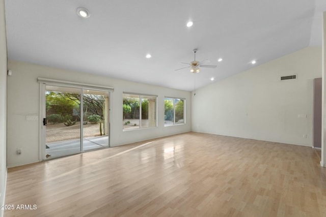 unfurnished living room featuring ceiling fan, recessed lighting, visible vents, vaulted ceiling, and light wood-type flooring