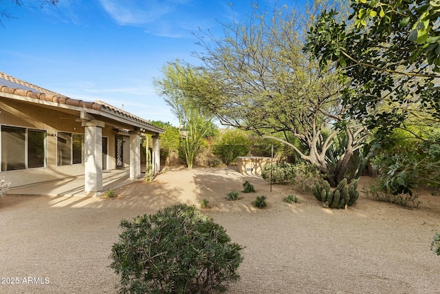 view of yard featuring a patio area and fence