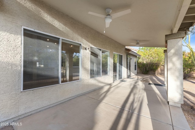 view of patio with ceiling fan