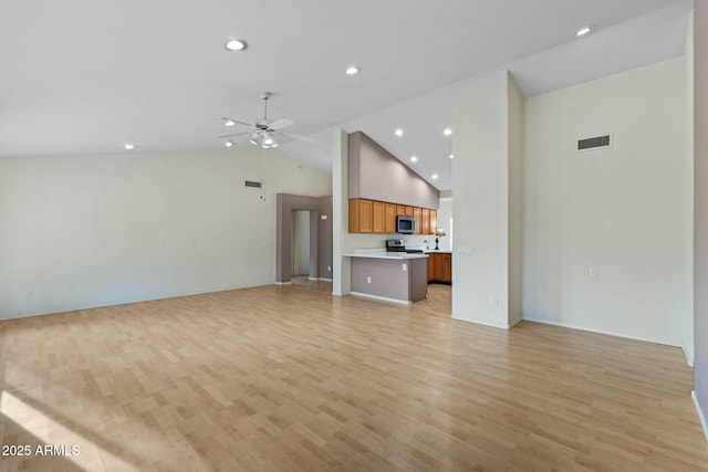 unfurnished living room with visible vents, ceiling fan, light wood-type flooring, high vaulted ceiling, and recessed lighting