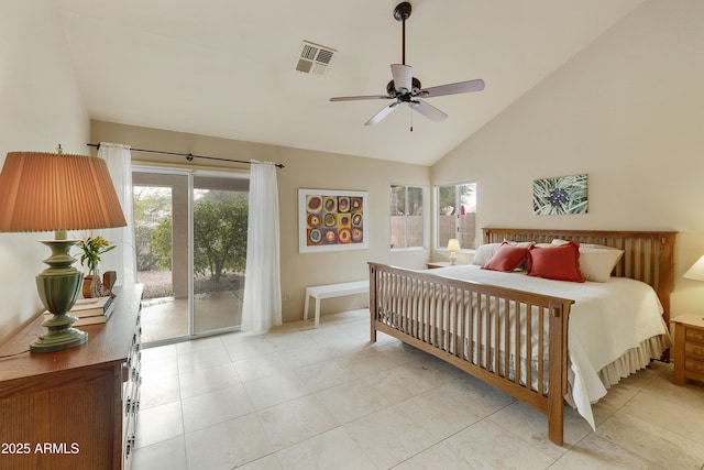 tiled bedroom featuring multiple windows, ceiling fan, access to exterior, and high vaulted ceiling