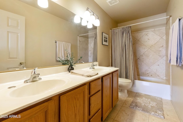 full bathroom with vanity, shower / bath combo, tile patterned floors, and toilet