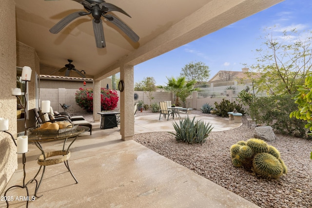 view of patio with ceiling fan