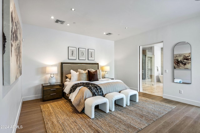 bedroom featuring wood-type flooring