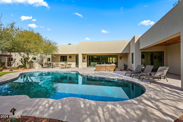 view of pool with a patio area