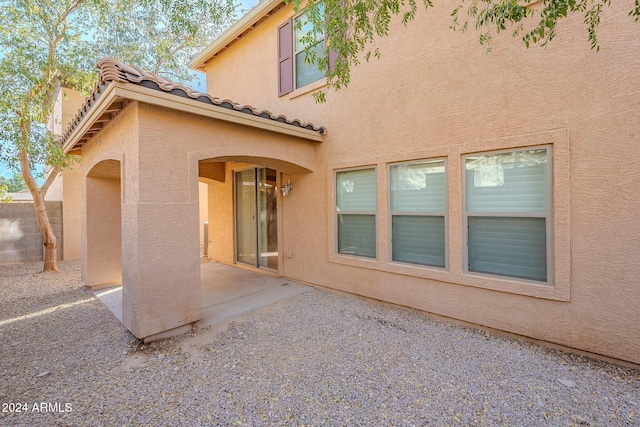 rear view of property with a patio area