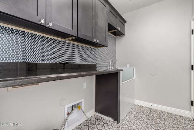 kitchen featuring dark brown cabinetry