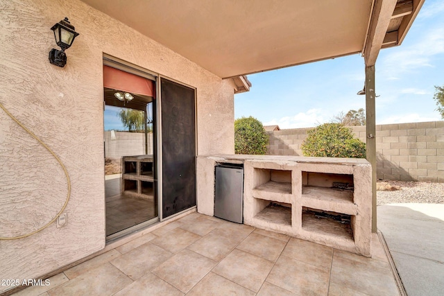 view of patio / terrace featuring exterior kitchen