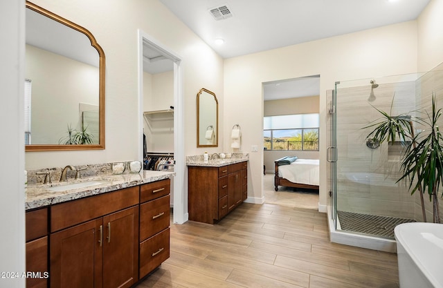 bathroom featuring vanity and walk in shower