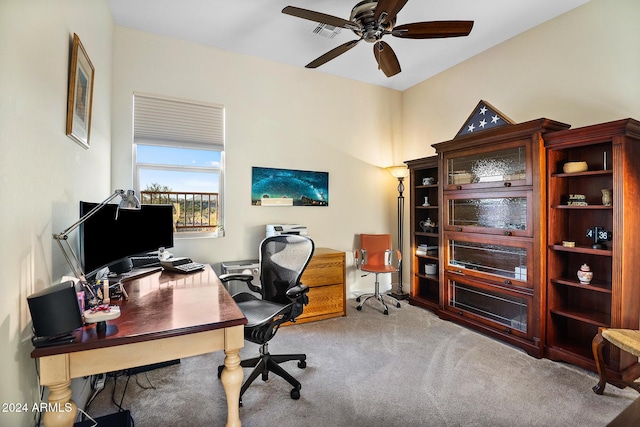 office space with carpet floors and ceiling fan