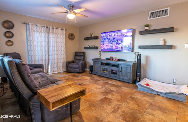 living room with ceiling fan