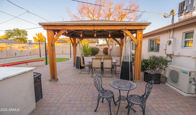 view of patio with a gazebo and ac unit